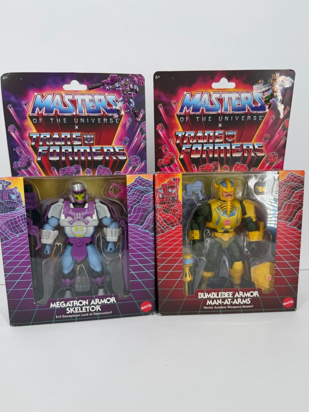 Masters of The Universe x Transformers Skeletor/Megatron & Man-At-Arms/Bumblebee